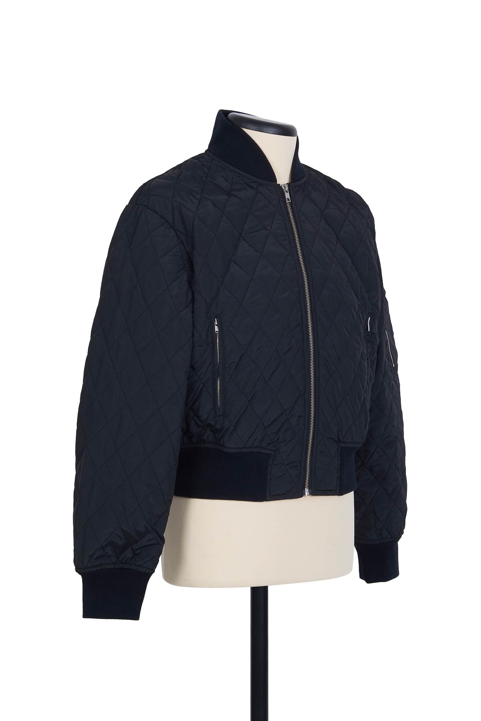 Black thermo‑quilted bomber by Random Identities. ribbed trims detail