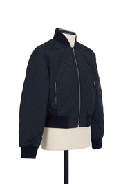 Black thermo‑quilted bomber by Random Identities. ribbed trims detail