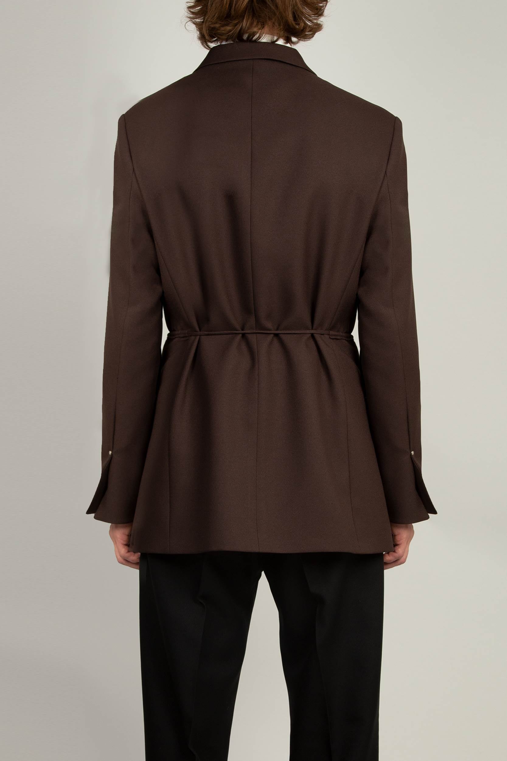 back view of Mid Brown Peak Lapel Coulisse Blazer by Random Identities showing clean tailored silhouette