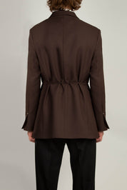 back view of Mid Brown Peak Lapel Coulisse Blazer by Random Identities showing clean tailored silhouette