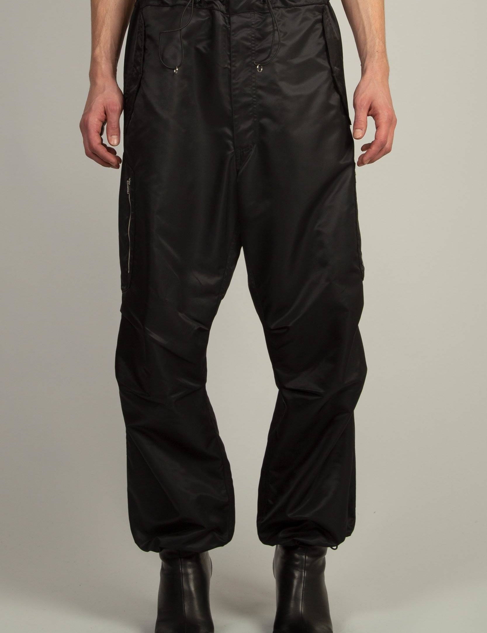 Random Identities Berlin Baggies in Black, relaxed fit nylon pant with coulisse at hem and waist and officer stripe detail