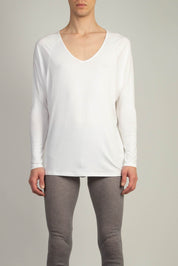 Random Identities Drapey V-Neck in White, long sleeve drapey jersey top with wide curved V-neck and raglan sleeves, front view