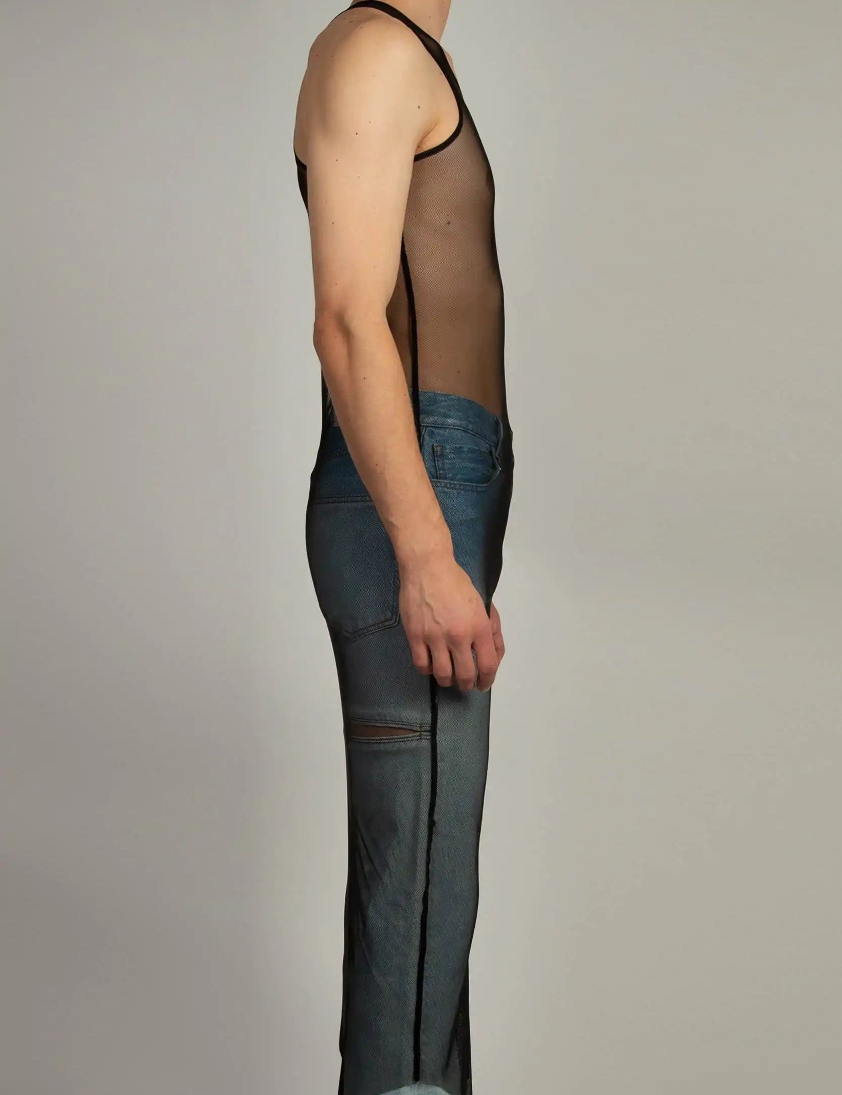 Black mesh long tank top with racerback silhouette and raw edge hem