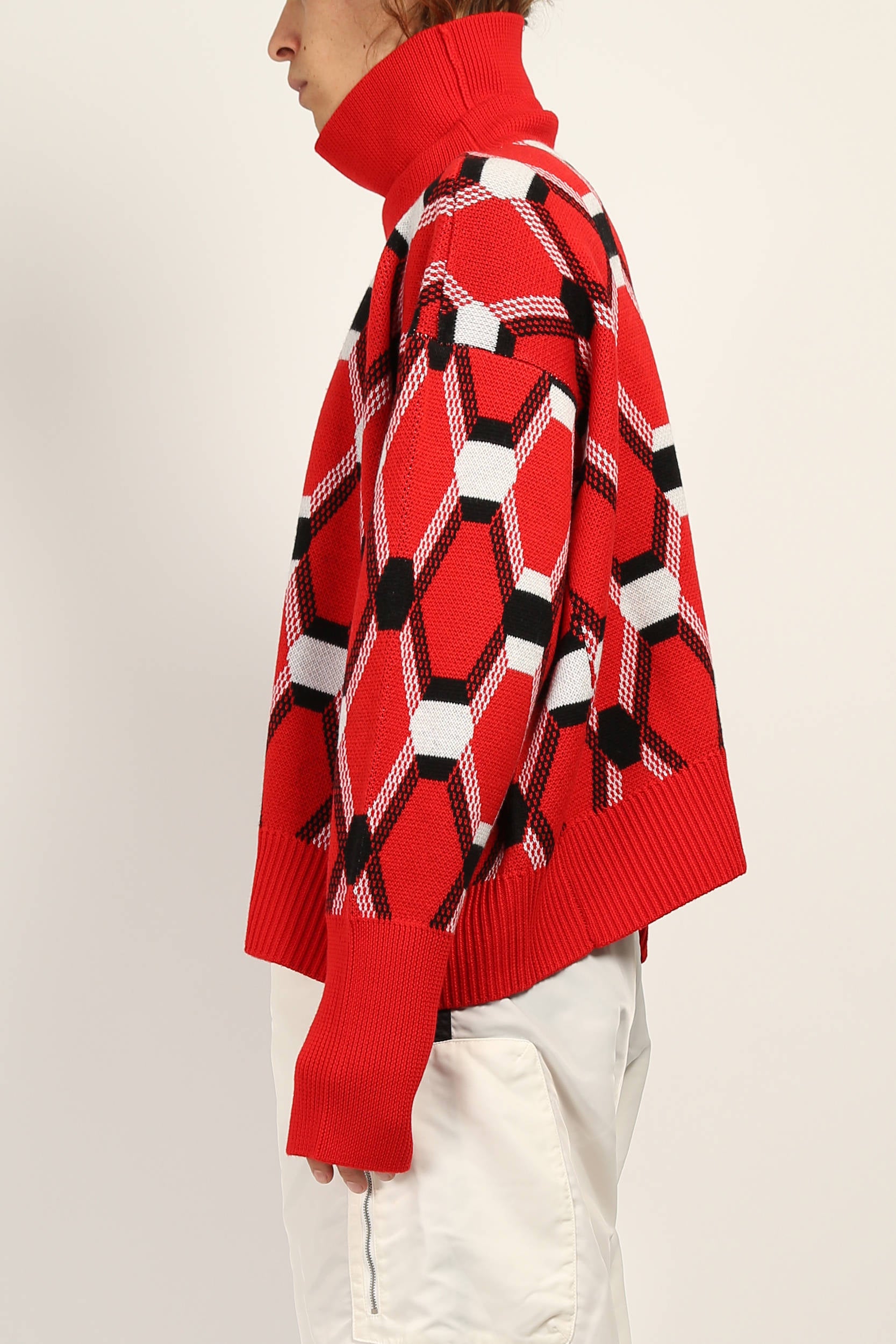 Red Roll Neck Jacquard Sweater by Random Identities featuring oversize fit and new argyle pattern, styled with tailored trousers