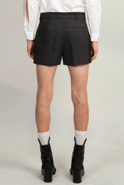 Detail of six double-button closure on the Random Identities Tailored Shorts, Black