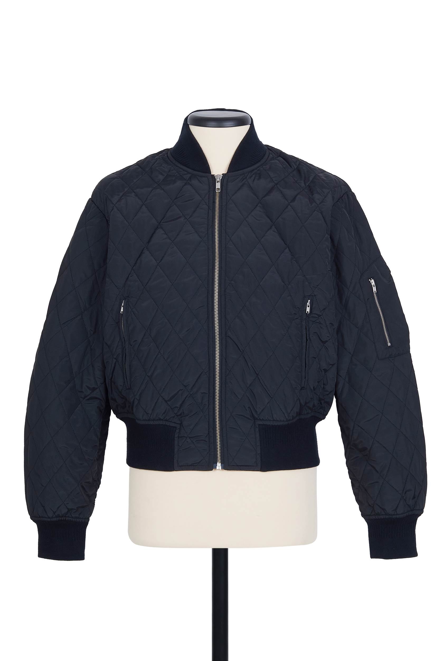 Random Identities Quilted Bomber in Black. thermo‑quilted jacket with classic ribbed finishings, regular fit