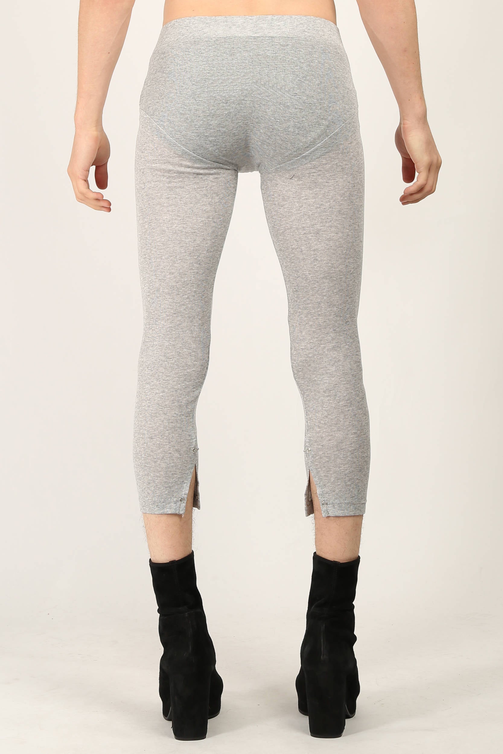 Side and back view of Light Grey Rib Leggings by Random Identities showing slim silhouette and split cuff