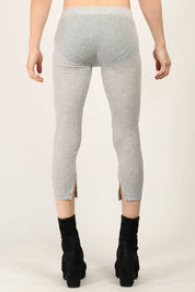 Side and back view of Light Grey Rib Leggings by Random Identities showing slim silhouette and split cuff