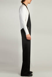 Black jersey halter neck jumpsuit with tailored pin tuck lines
