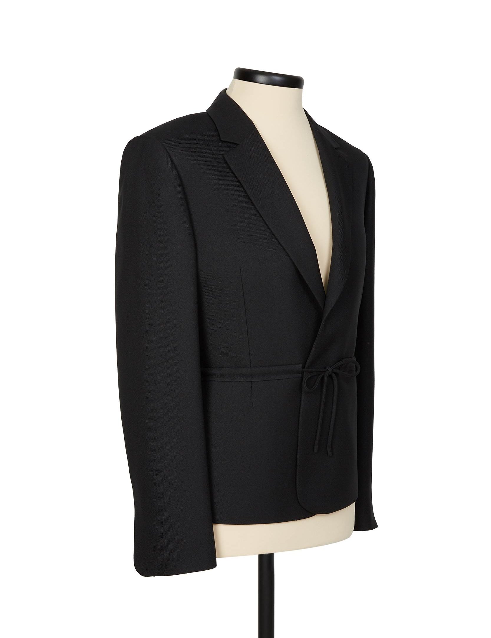 Black gabardine micro blazer by Random Identities. slim fit with notch lapel and coulisse detail