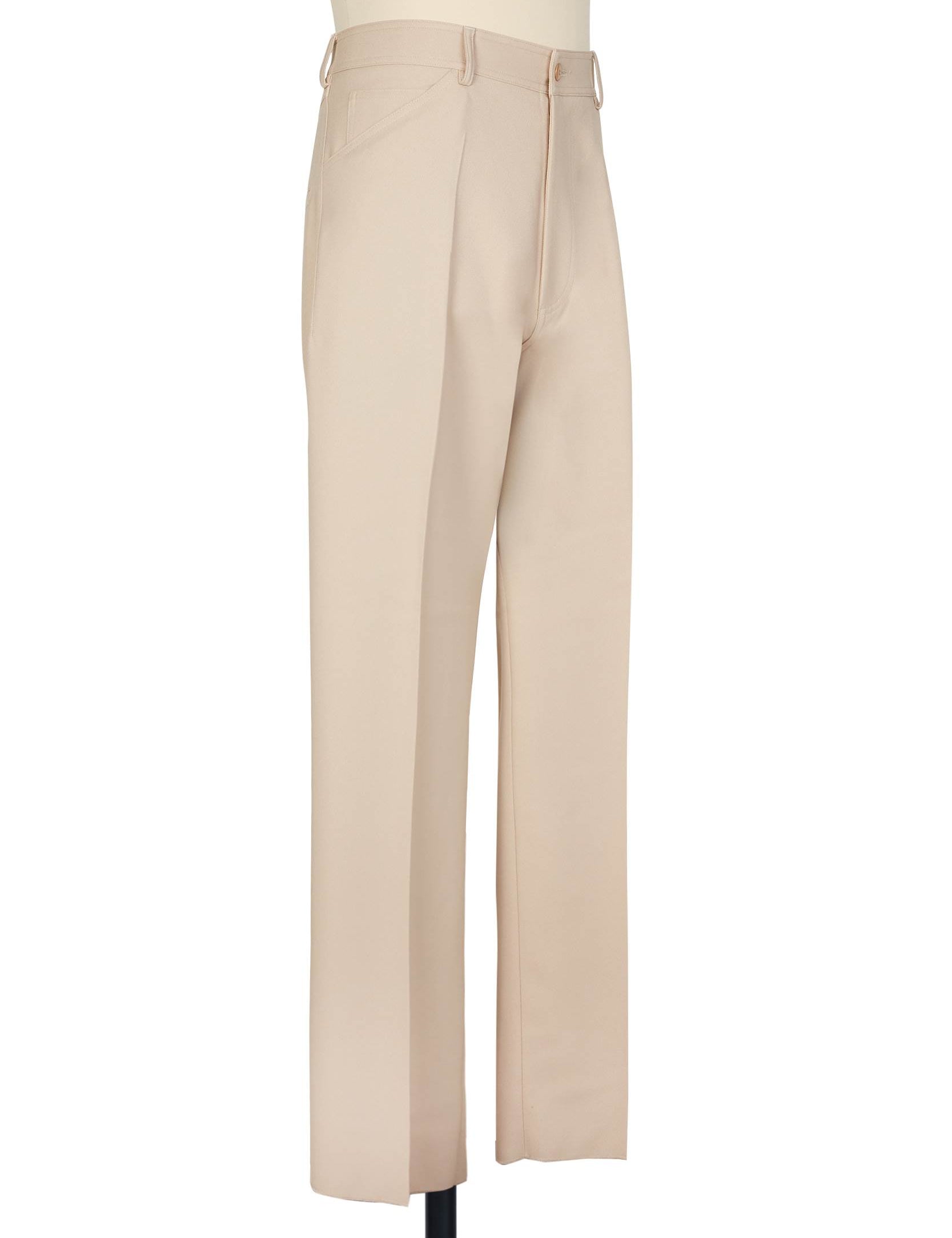 Beige high-rise trousers. single jet back pockets and yoke insert, polyester gabardine