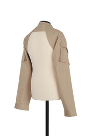 Shrug Jacket in Beige. sleeve cargo pocket detail, 100% cotton, regular fit