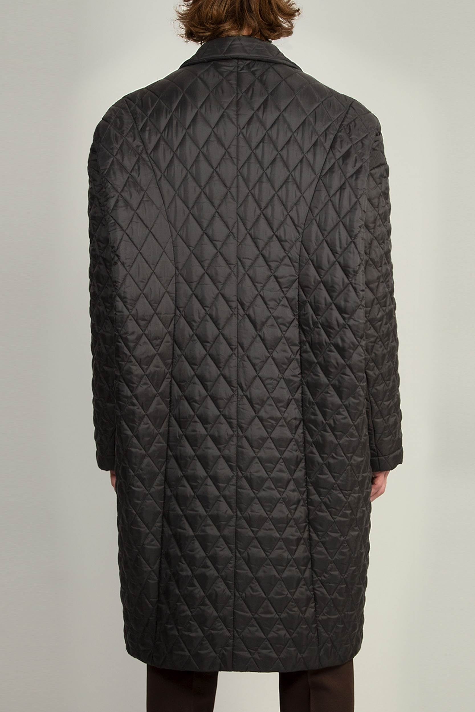 Egg Shape Coat in Black styled in an oversized silhouette