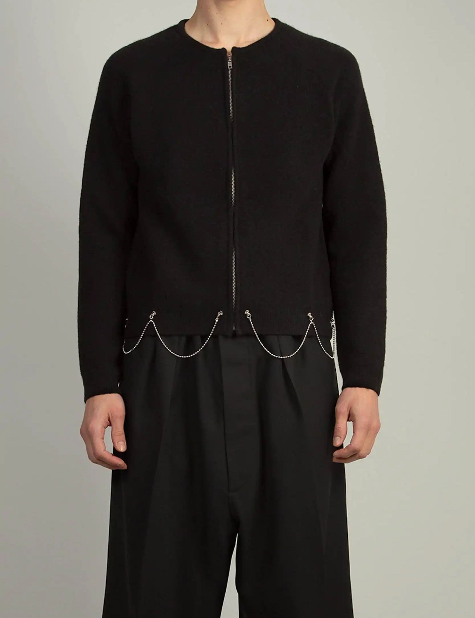 Random Identities Full Zip Cardigan With Chain in Black with saddle sleeves and 1x1 rib trims, front view