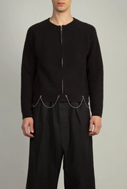 Random Identities Full Zip Cardigan With Chain in Black with saddle sleeves and 1x1 rib trims, front view