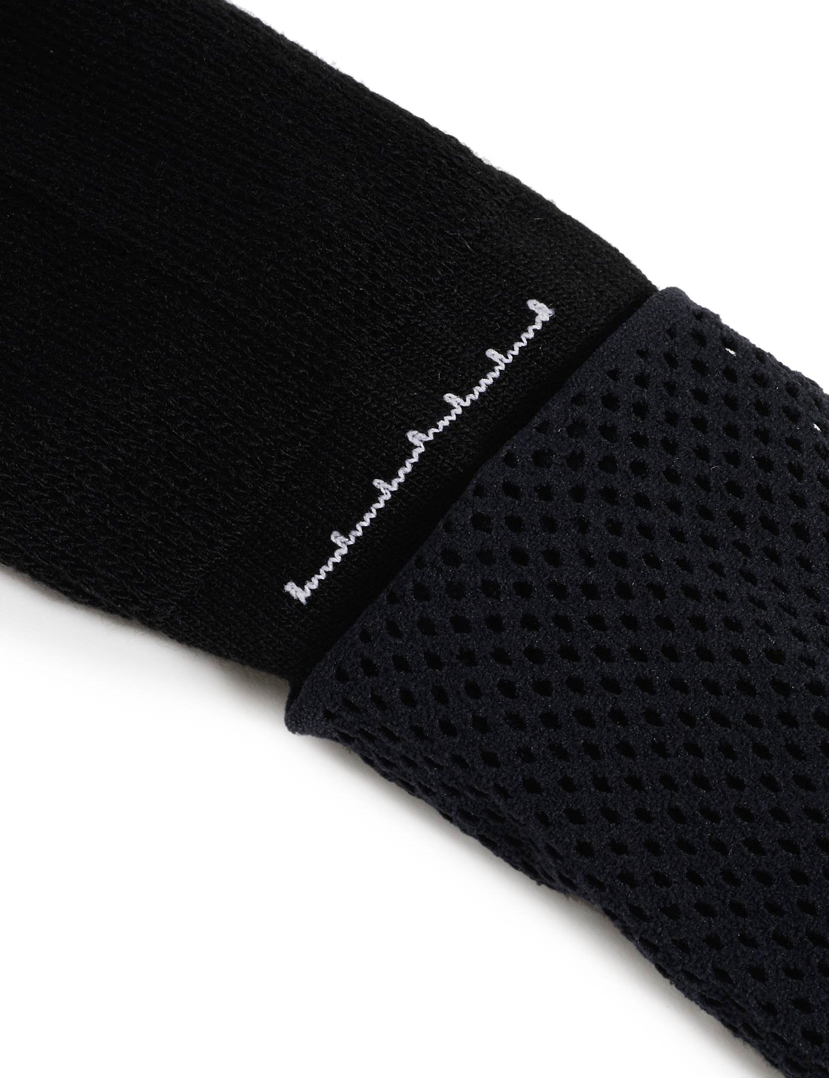 Black logo sports sock with cushioned sole and supportive arch band