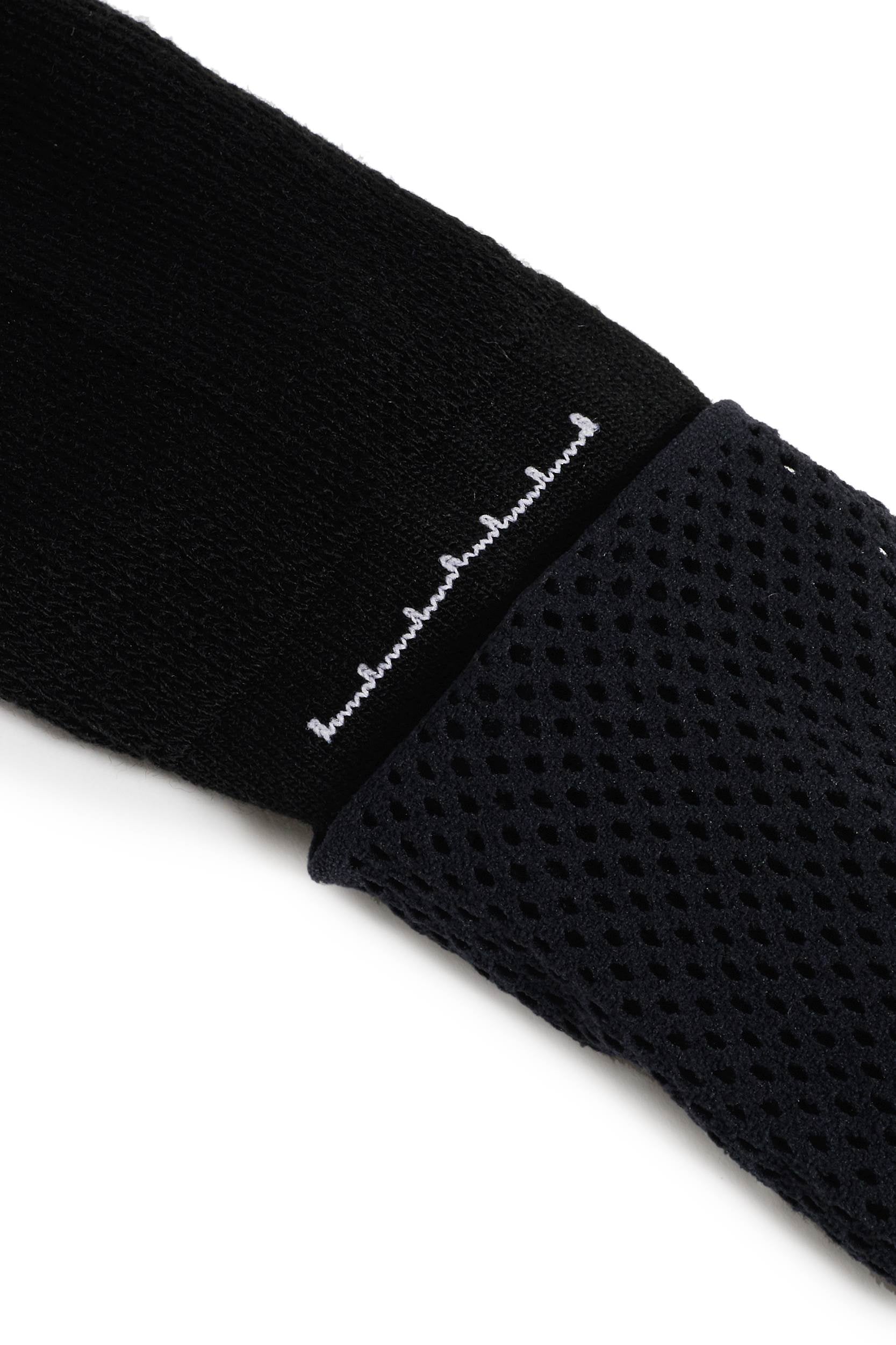 Black logo sports sock with cushioned sole and supportive arch band