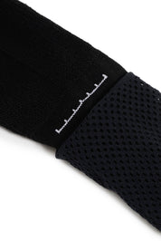 Black logo sports sock with cushioned sole and supportive arch band