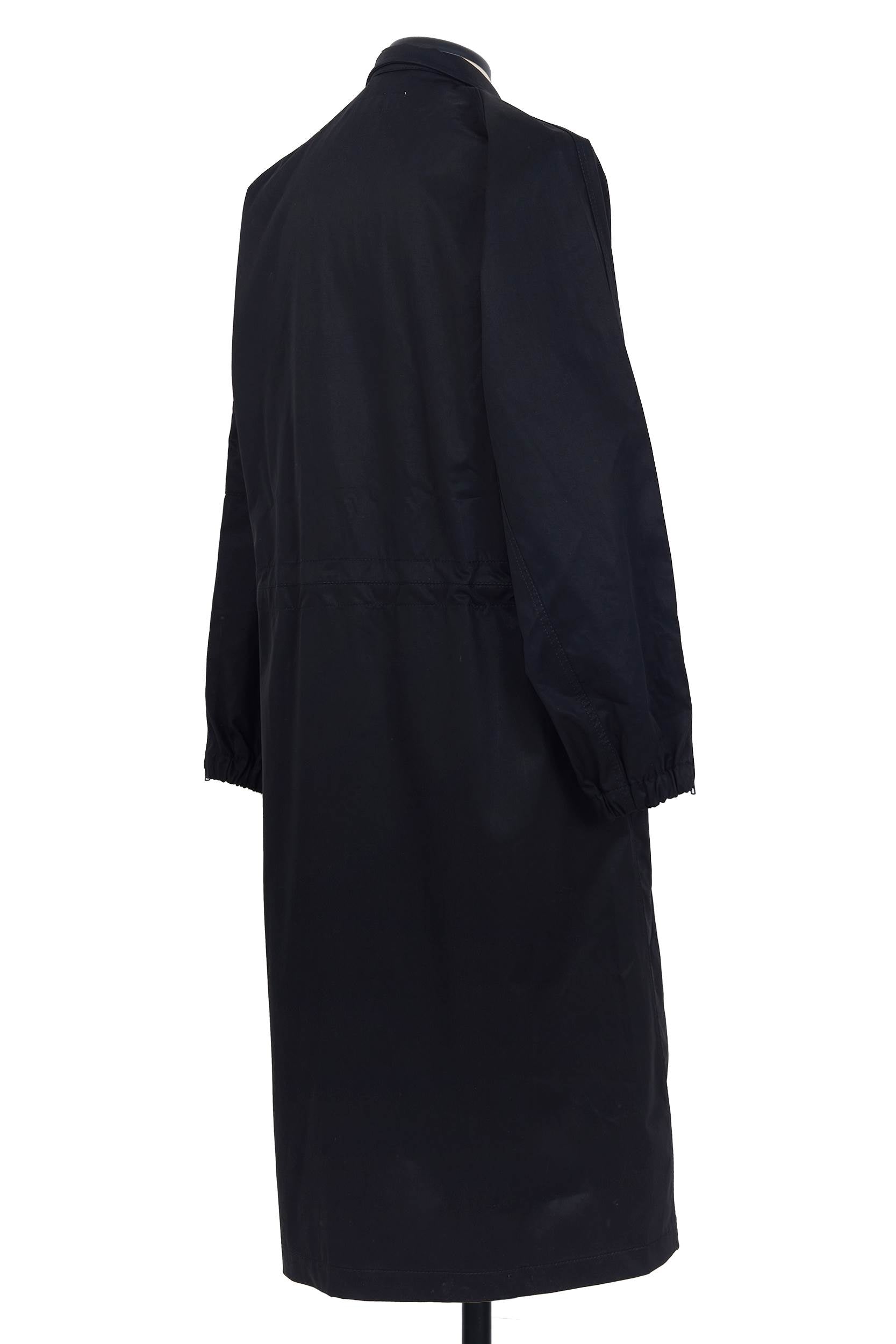 Random Identities coat. zippered vents at elasticized cuffs, unlined construction in Black