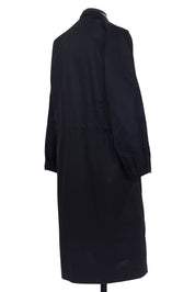 Random Identities coat. zippered vents at elasticized cuffs, unlined construction in Black