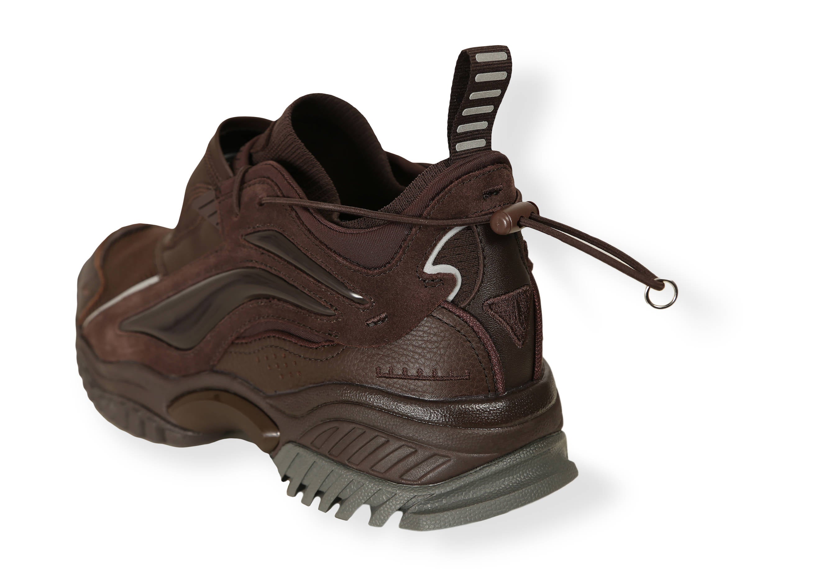 Brown Aurora sneaker with lace up and toggle laces on rubber sole