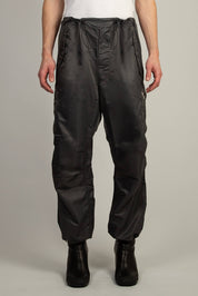 Random Identities Berlin Baggies in Grey, relaxed fit nylon pant with drawcord at hem and waist and officer stripe detail