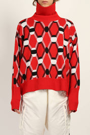 Random Identities Roll Neck Jacquard Sweater in Red, oversize mid-gauge roll neck with four-colour argyle jacquard, front view