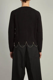 Back view of Black boy’s-fit full-zip cardigan with saddle sleeves by Random Identities