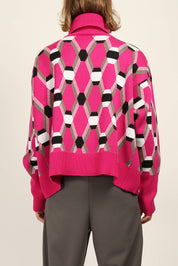 Back view of Pink oversize roll neck jacquard sweater by Random Identities showing mid-gauge knit and relaxed silhouette