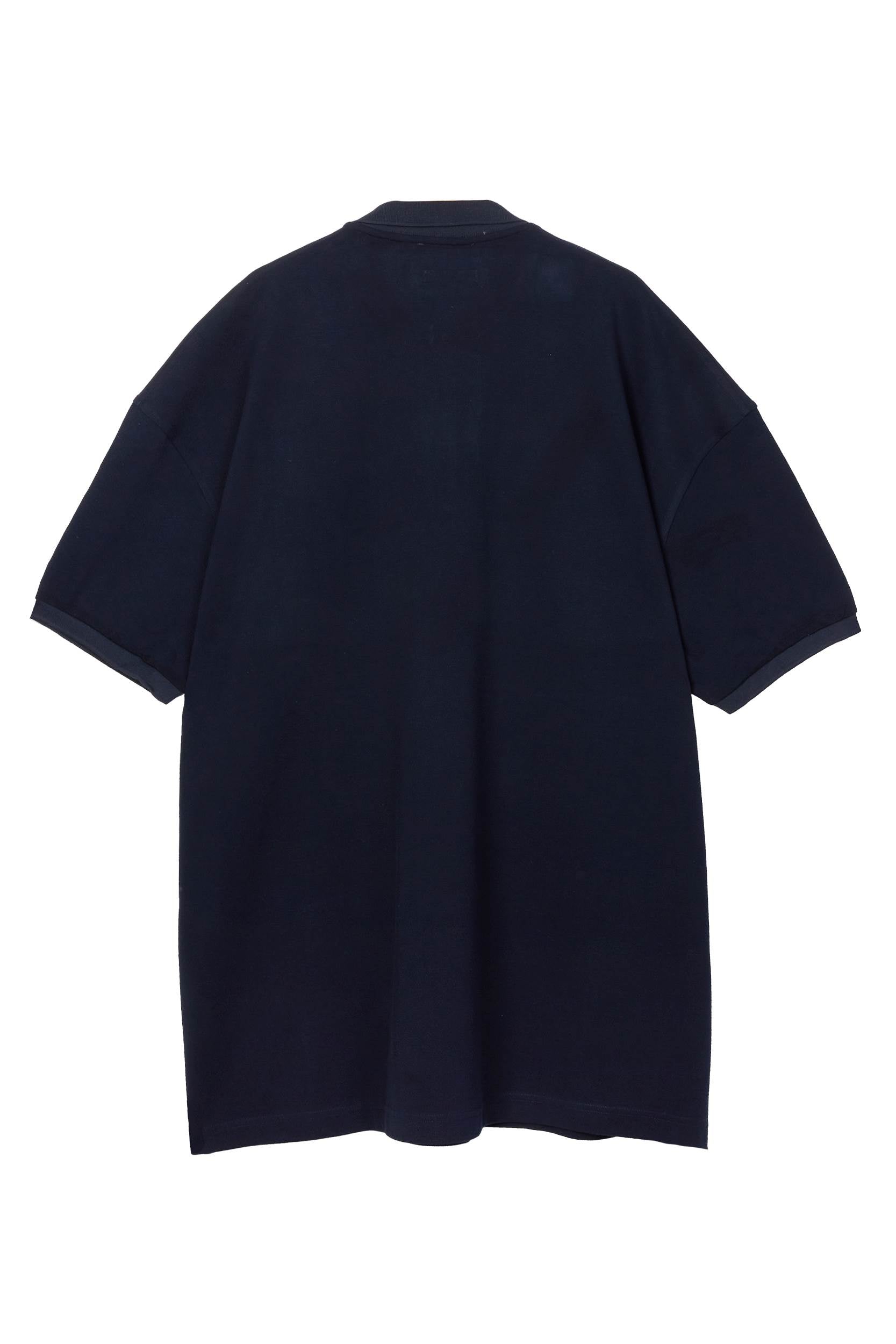 Navy piqué maxi polo by Random Identities. covered zip placket, flat-knit collar