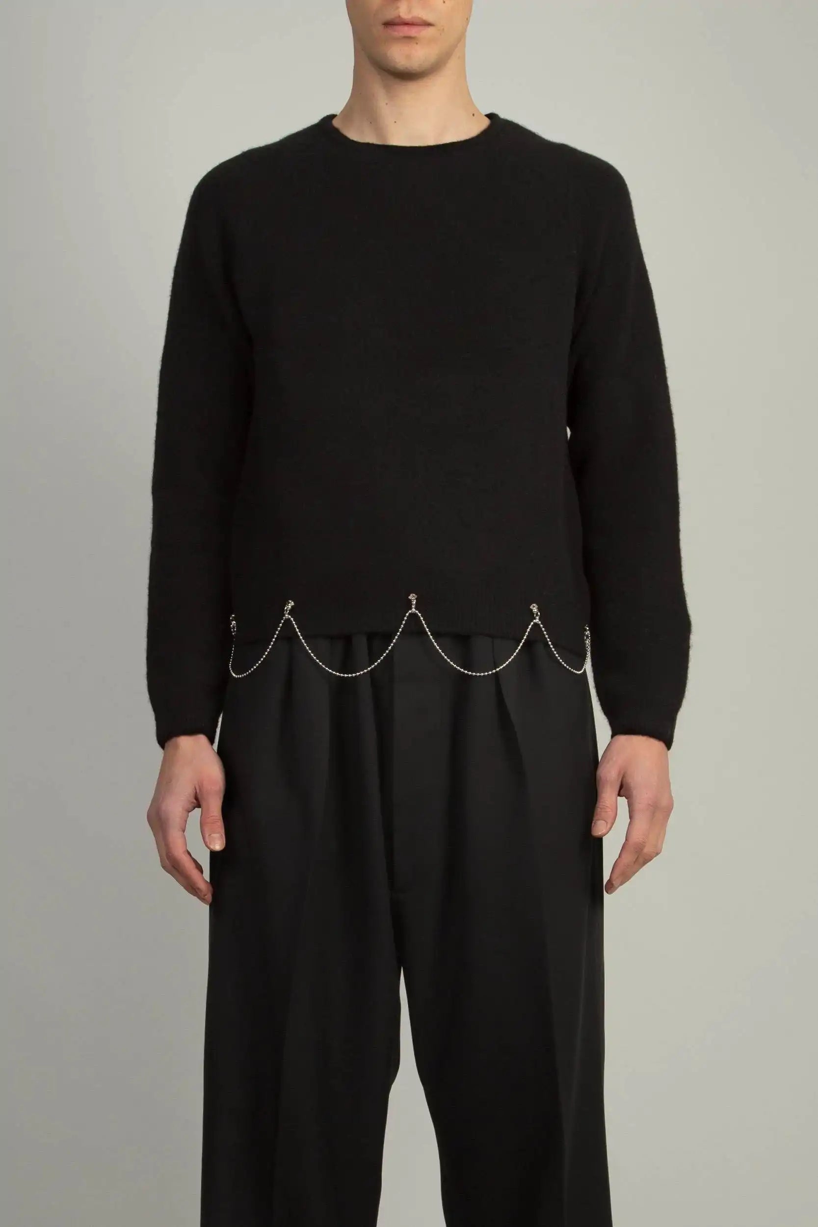 Random Identities Crew Neck With Chain in Black, stretch Shetland wool boy’s fit sweater with saddle sleeves and chain at hem, front view