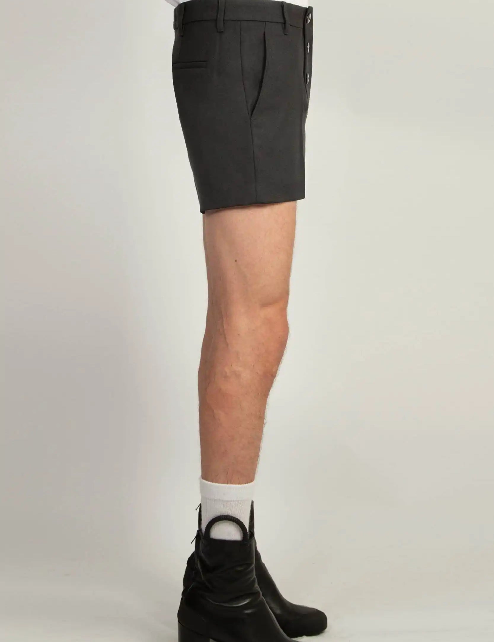 Black gaberdine tailored shorts by Random Identities featuring distinctive six double-button fastening