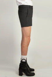 Black gaberdine tailored shorts by Random Identities featuring distinctive six double-button fastening
