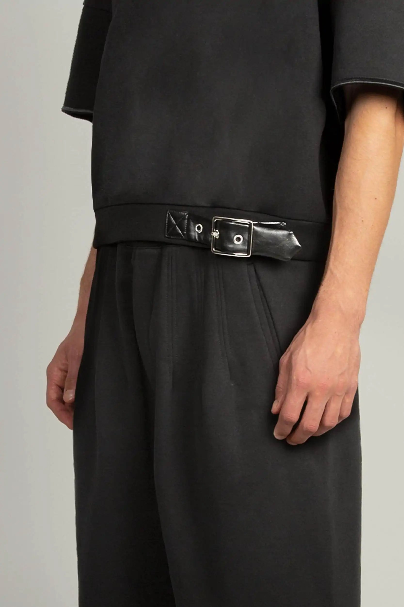 Close-up of faux leather belt detail and self-fabric trims on the Random Identities Sweatshirt With Emphasised Back in Black