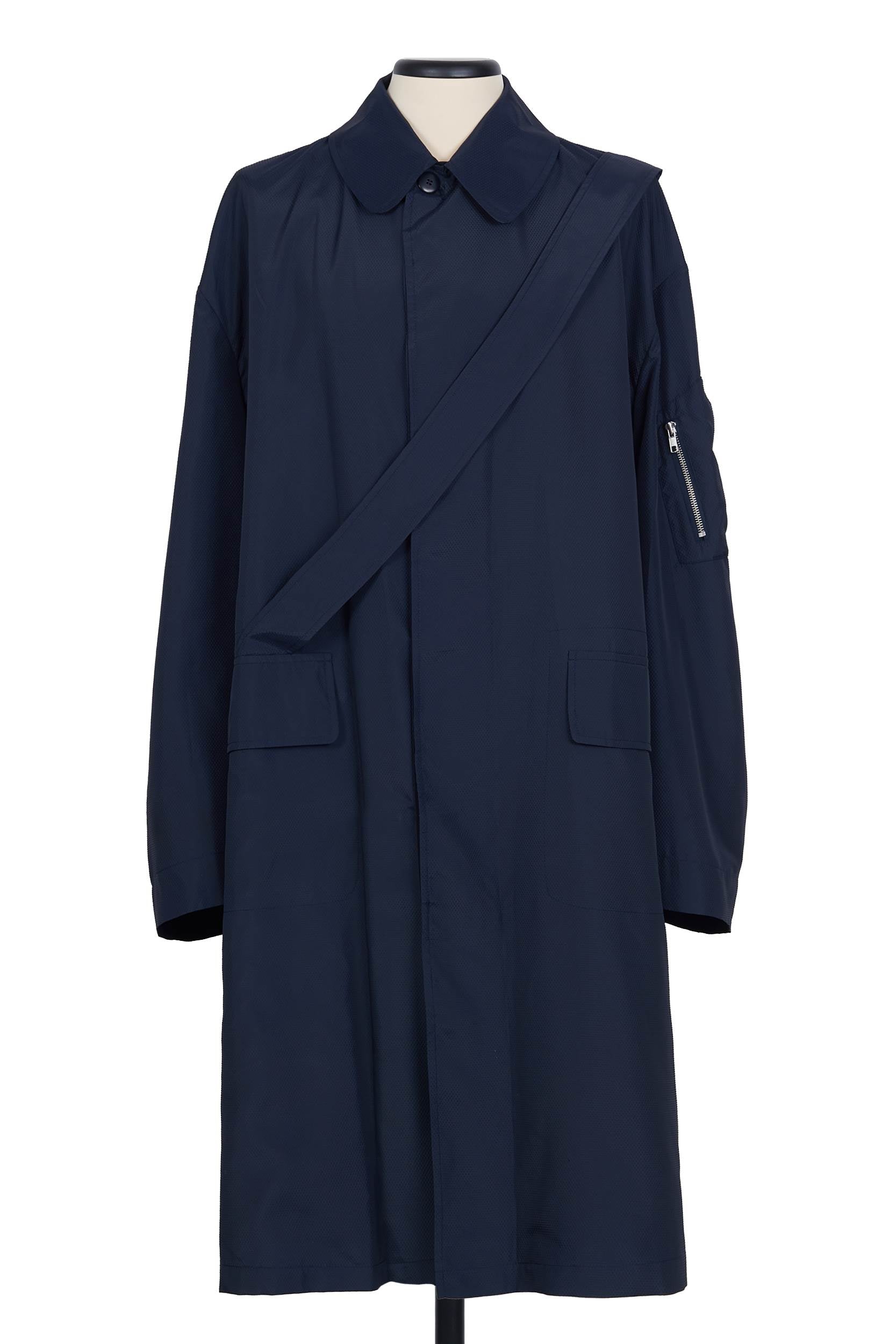 Random Identities Raincoat With Strap in Navy, light textured nylon with flap pockets and diagonal self‑fabric strap 