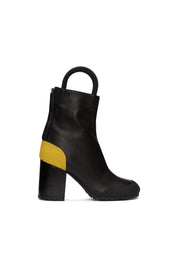 Random Identities Worker Boots in Yellow. leather ankle boot with rubber toe cap and 9 cm heel, made in Italy 