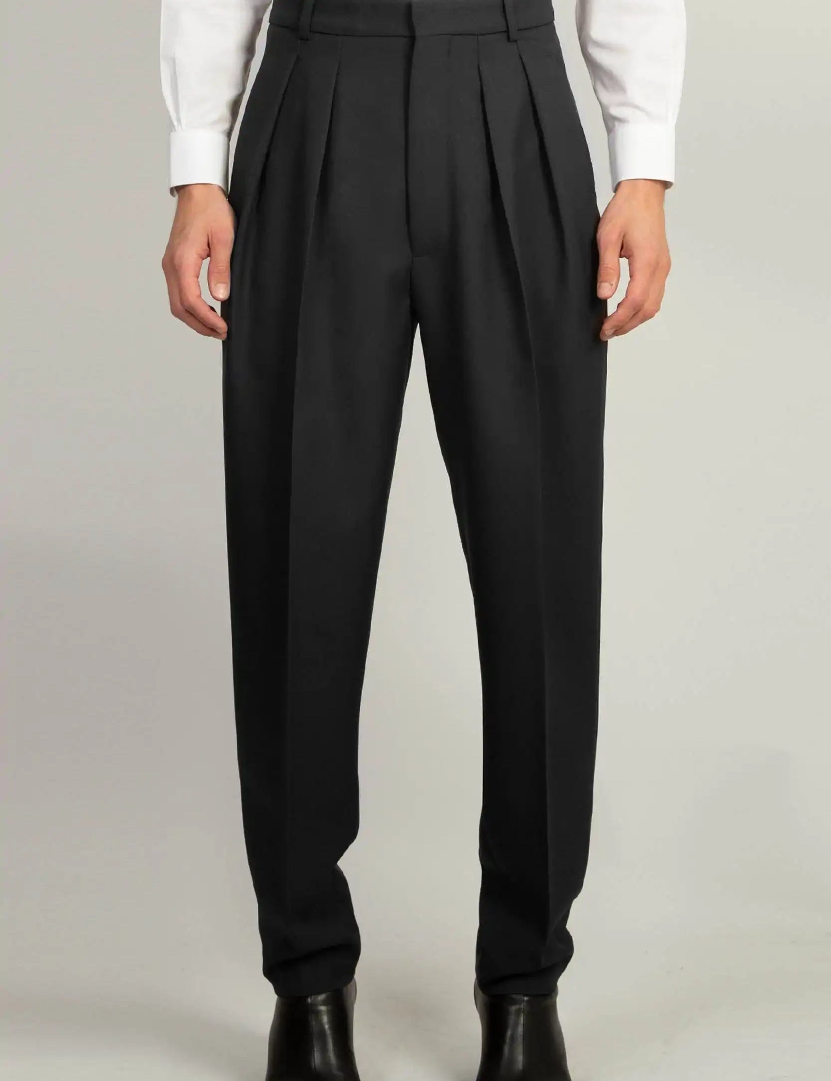 Random Identities Pleated Tapered Trouser in Black, gaberdine high waist two-pleat tapered trouser, front view