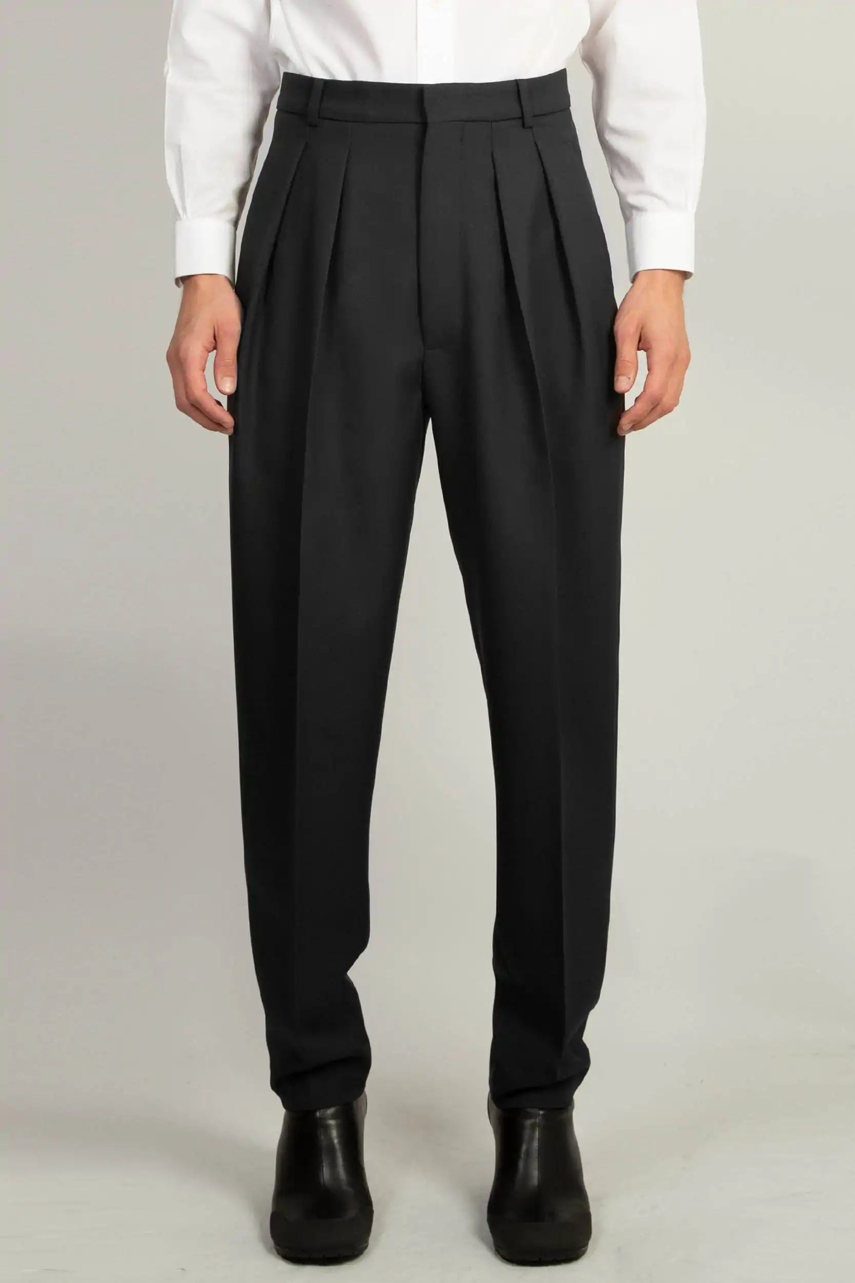 Random Identities Pleated Tapered Trouser in Black, gaberdine high waist two-pleat tapered trouser, front view