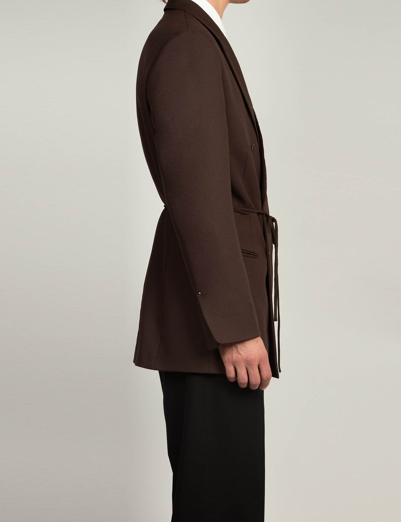 Mid Brown Peak Lapel Coulisse Blazer by Random Identities styled with matching pleated tapered trouse