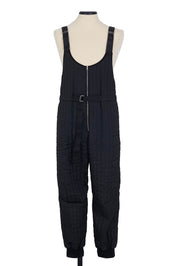 Random Identities Quilted Salopette in Black. thermo‑quilted jumpsuit with adjustable length, regular fit