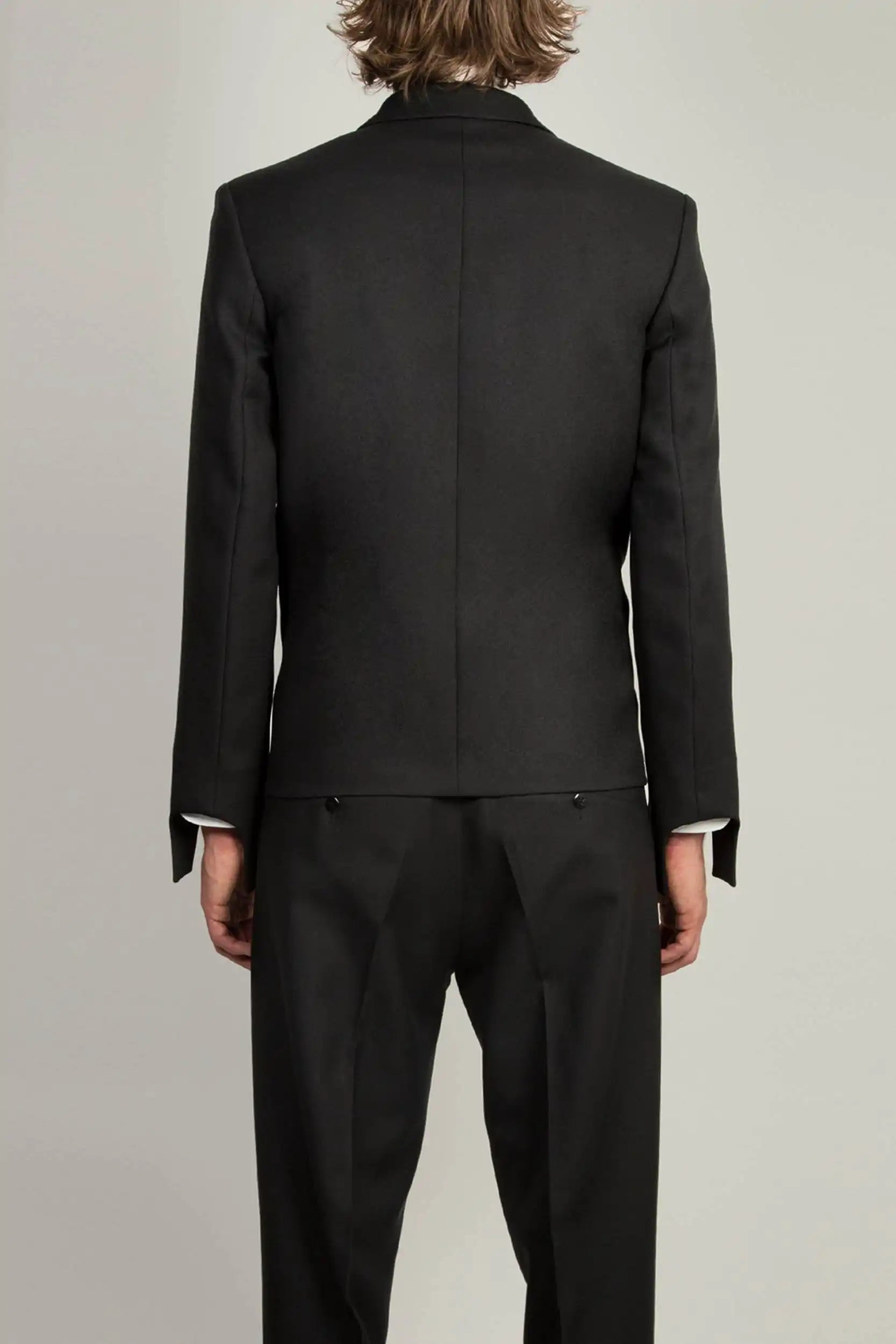 Back view of Black Coco Blazer showcasing clean lines and minimalist tailoring by Random Identities