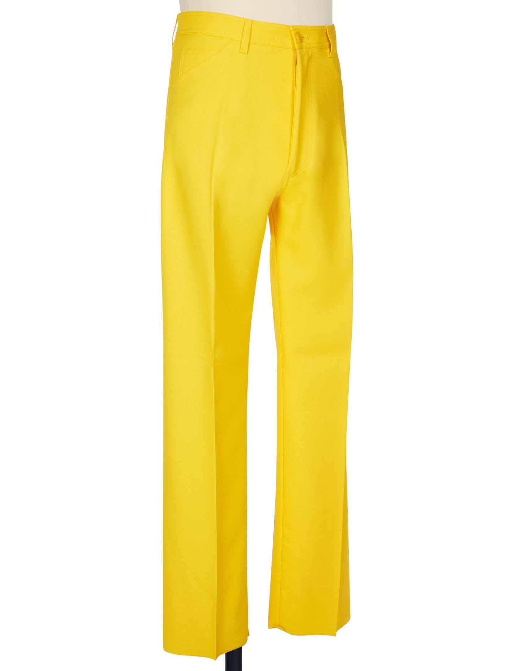 Yellow high-rise five-pocket trousers with single jet back pockets and yoke insert, polyester gabardine