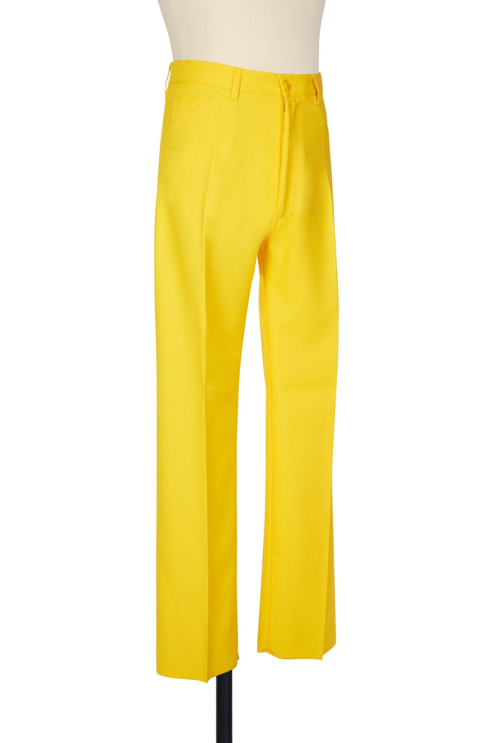 Yellow high-rise five-pocket trousers with single jet back pockets and yoke insert, polyester gabardine