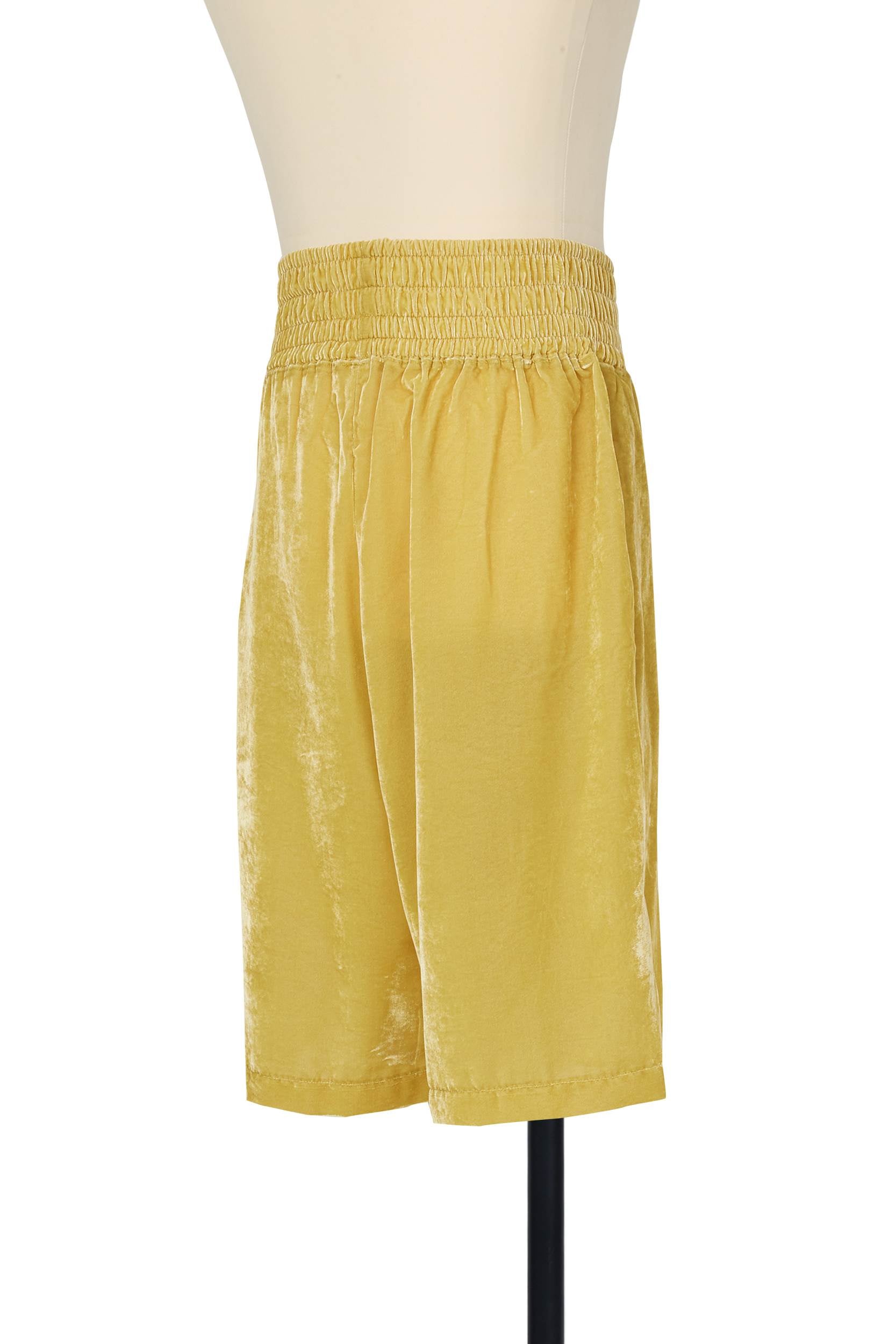Generous fit wide leg velvet boxing shorts in Golden Yellow