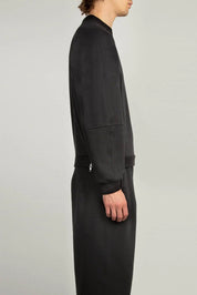 Black raglan crewneck sweatshirt with ribbed cuffs and hem