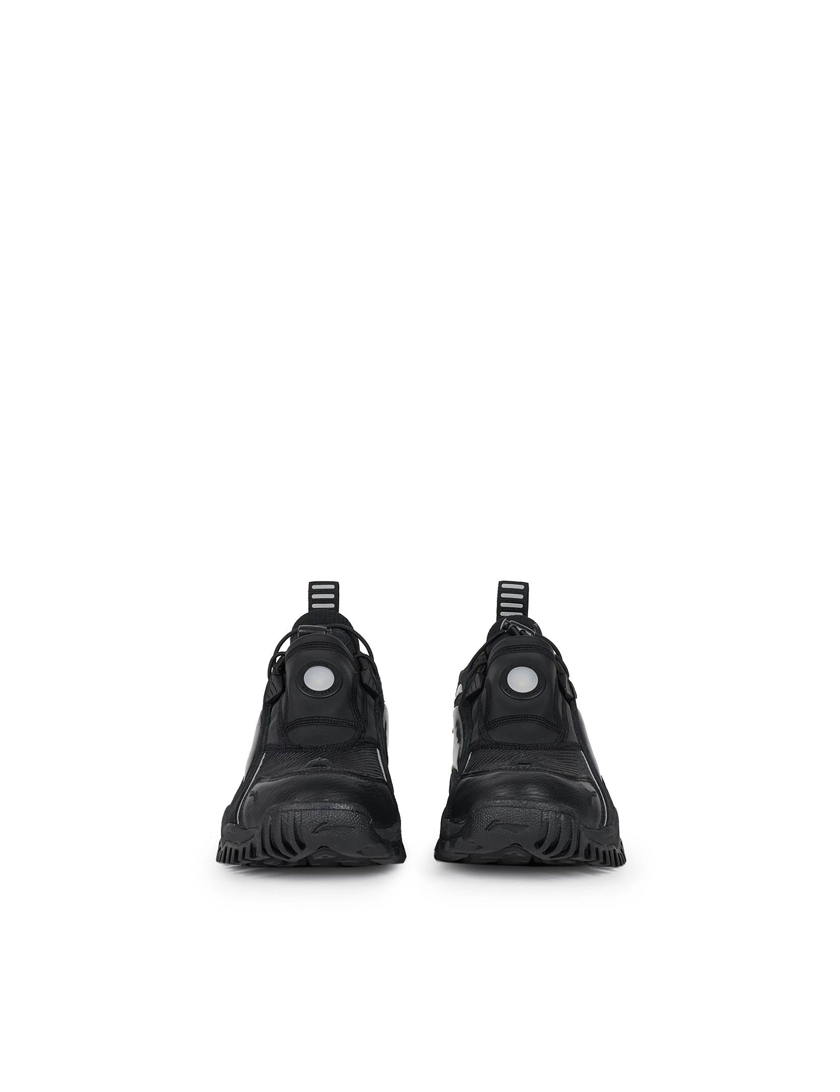 Black Aurora sneaker with lace up and toggle fastening laces on rubber sole