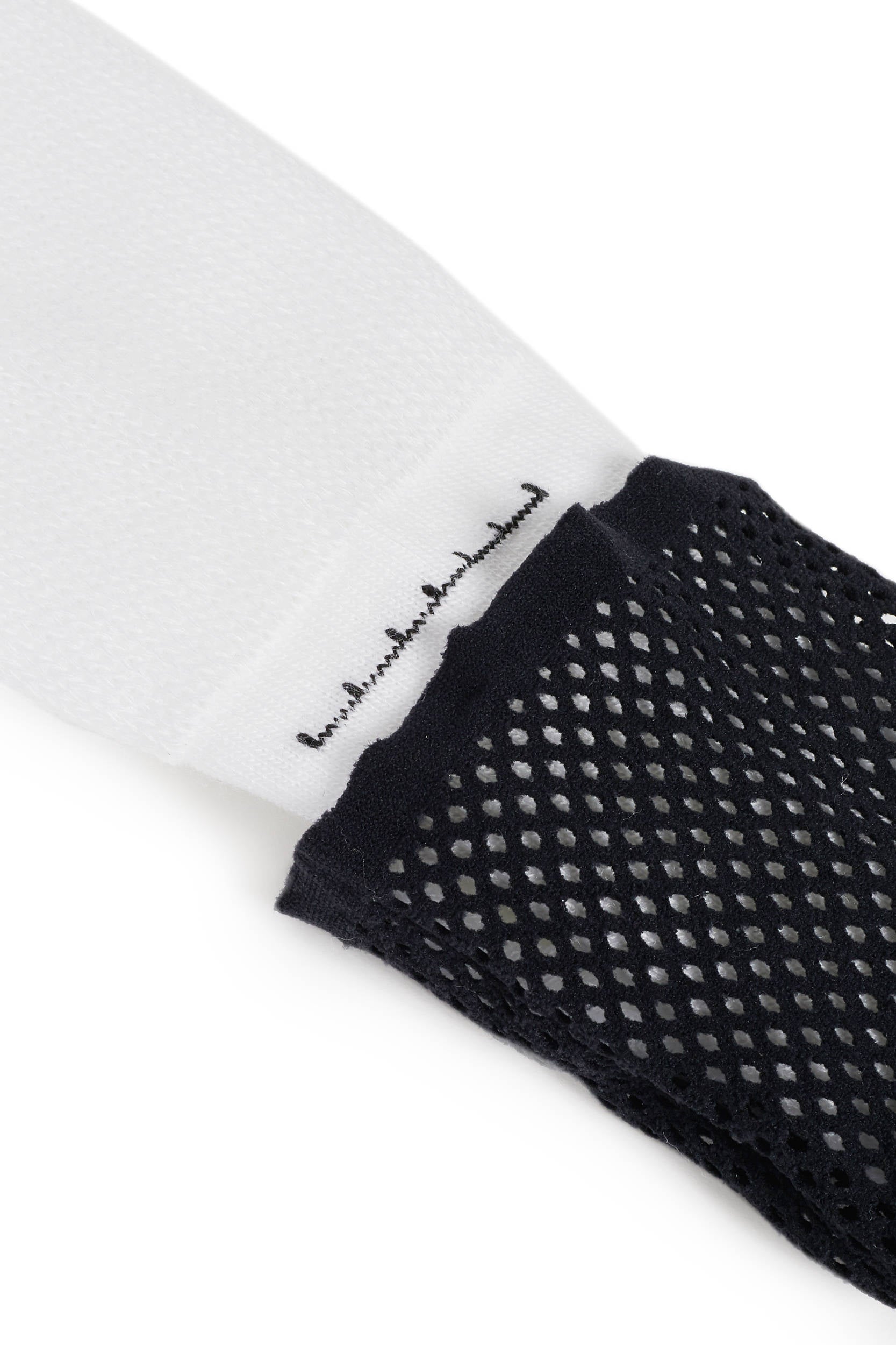 White logo sports sock featuring cushioned sole and supportive arch band