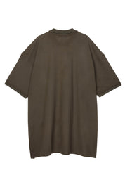 Bronze piqué maxi polo by Random Identities. covered zip placket, flat-knit collar