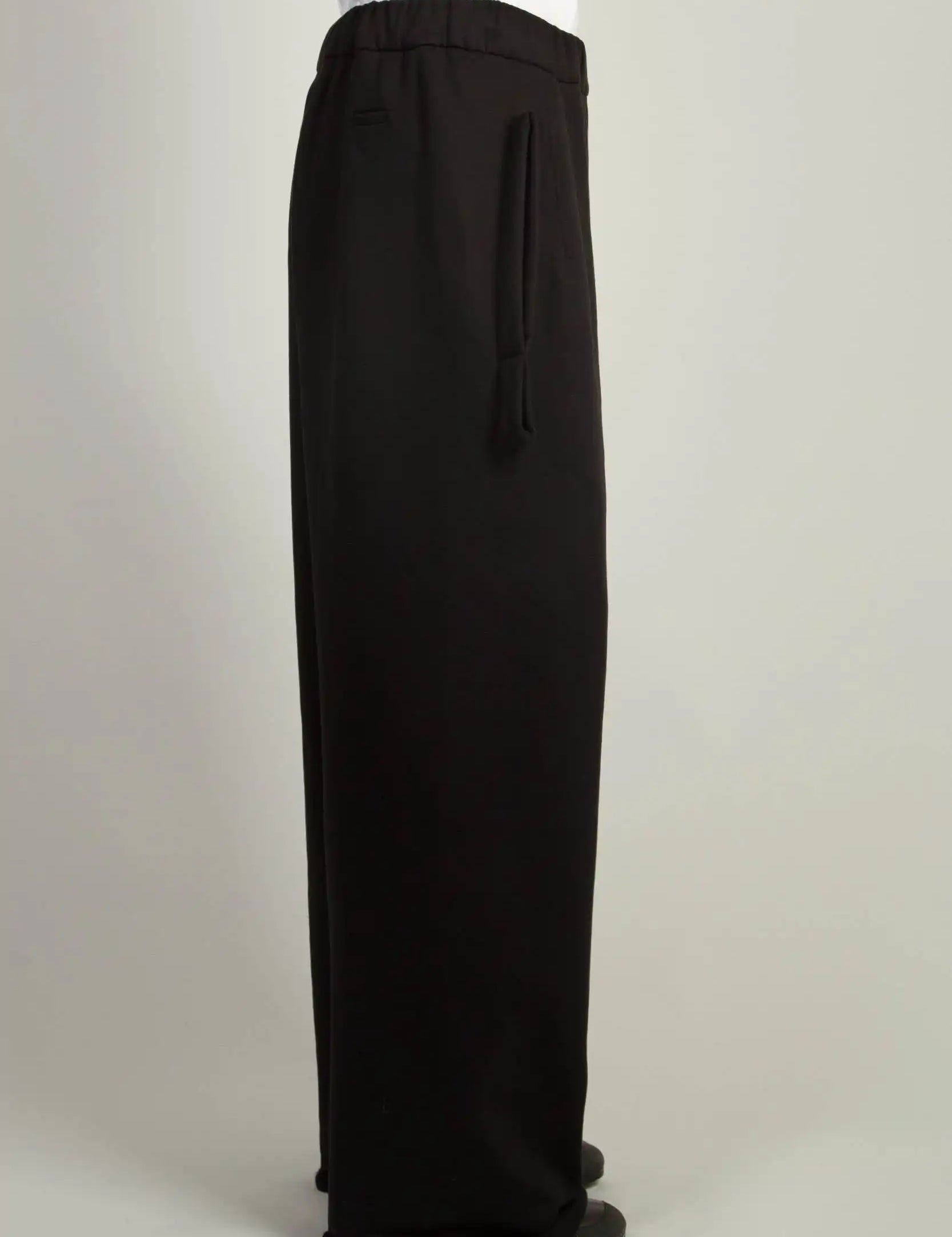 Black Wide Sweatpant by Random Idities showing dart details at front, elasticated waist, and coulisse
