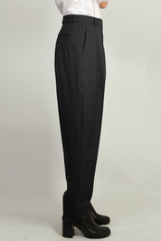 Black Pleated Tapered Trouser by Random Identities styled with buttonless blazer, tapered leg silhouette